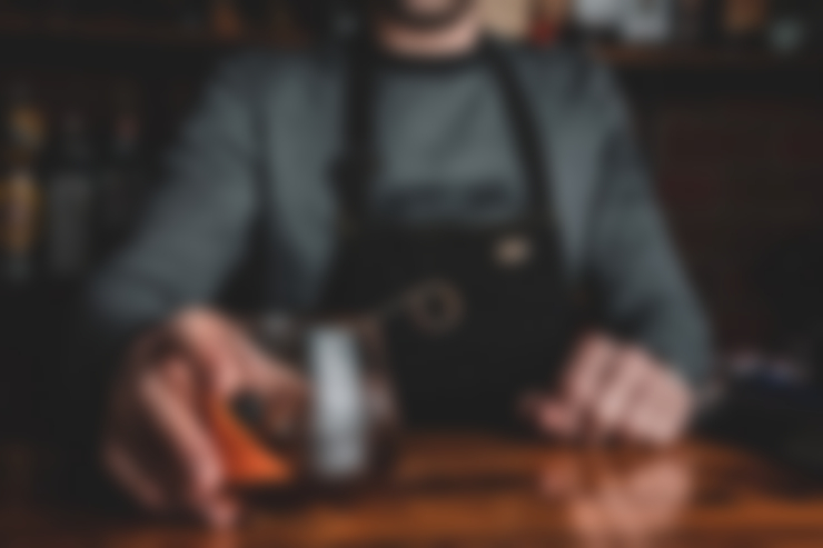 barman-with-cocktail_181624-77